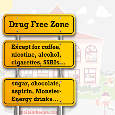 Cartoon featuring a sign in front of a grade school reading: Drug Free Zone... except for coffee, nicotine, alcohol, cigarettes, SSRIs... sugar, chocolate, aspirin, Monster-Energy drinks...