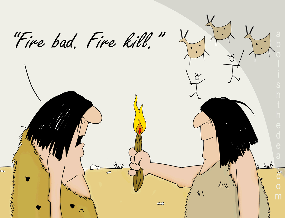 Two cavemen in cave.  Caveman on right, holding burning stick toward second caveman on left. Caveman on left says: 'Fire bad. Fire kill.'
