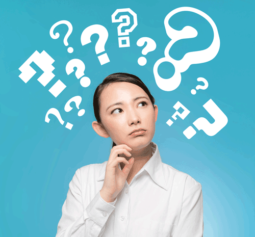 pesnive young woman with question marks appearing over her head